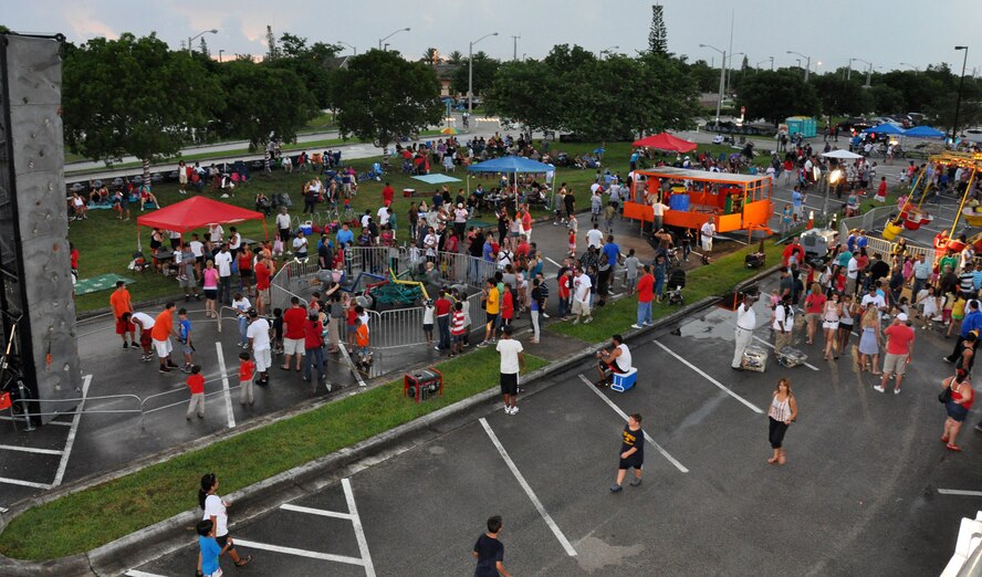 Hundreds of base personnel and their friends and families came to Homestead Air Reserve Base 4th of July celebration to enjoy the free event of music, food, rides and fireworks. (U.S. Air Force photo/Senior Airman Jacob Jimenez)