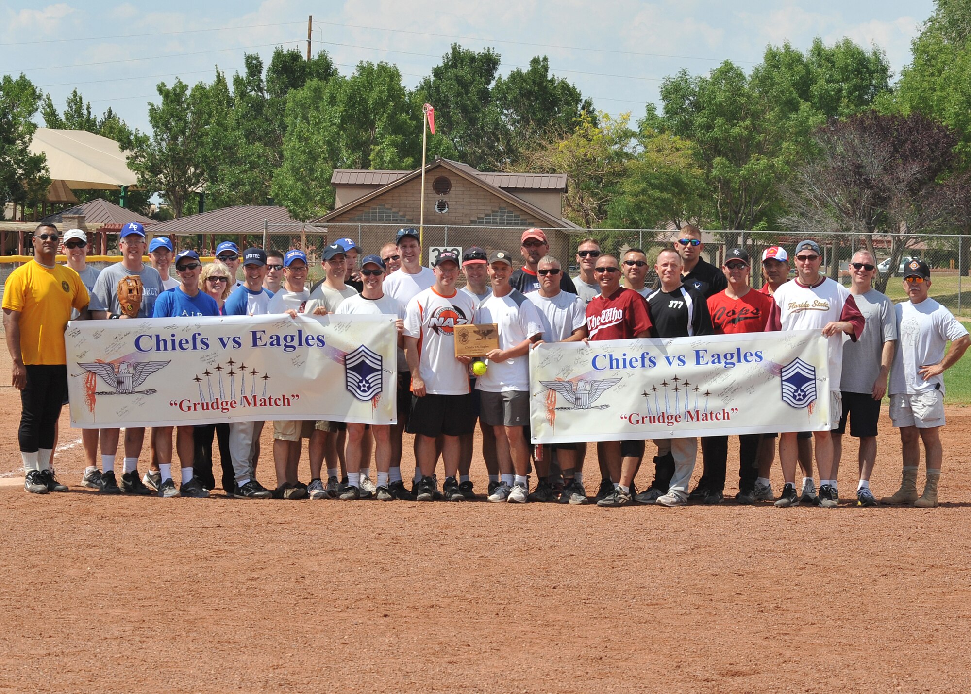 KIRTLAND AFB, N.M. – Team Kirtland colonels and chiefs faced off in a softball game July 3 at Kirtland Air Force Base. The chiefs came out on top, 17-14. (Photo by Todd Berenger)
