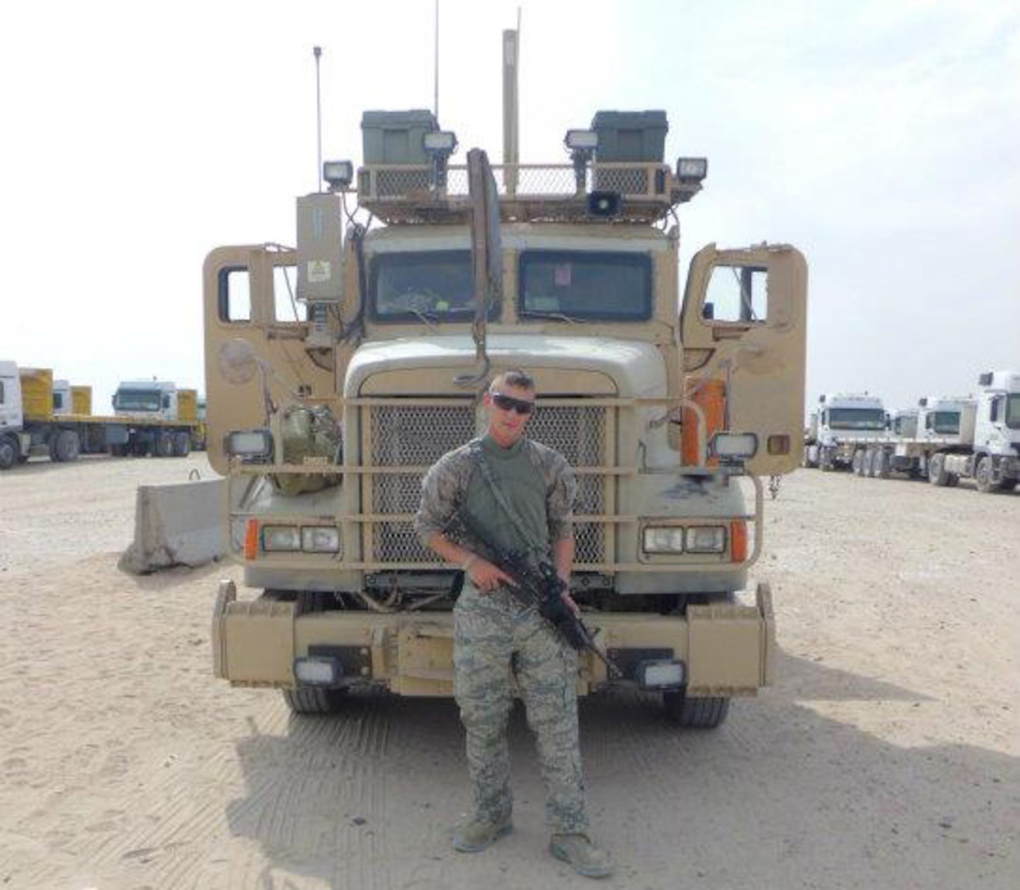 CAMP ARIFJAN, Kuwait -- Senior Airman William Peters, 509th Logistics Readiness Squadron vehicle operations, prepares for a convoy during his deployment.  Peters was deployed from July 2011 until February 2012, where he was a part of convoys that went into Iraq to bring equipment in and out of the country. (Courtesy Photo)