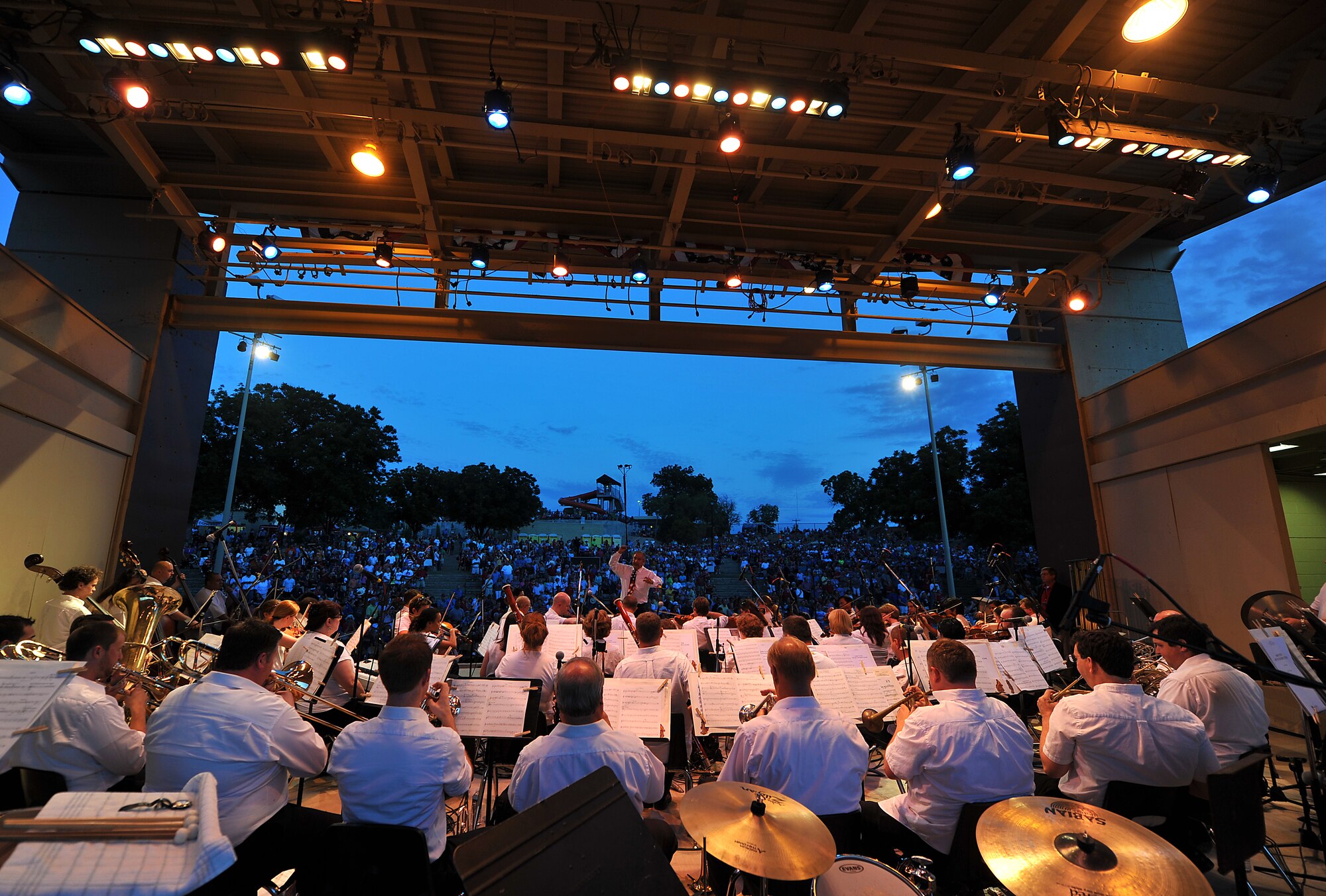 SAN ANGELO, Texas-- The San Angelo Symphony plays a song during the July 3rd Pops Concert at the Bill Aylor Sr. Memorial River Stage. The symphony entertained the crowd with various songs and even synchronized their music with the fireworks. (U.S. Air Force photo/Airman 1st Class Michael Smith)