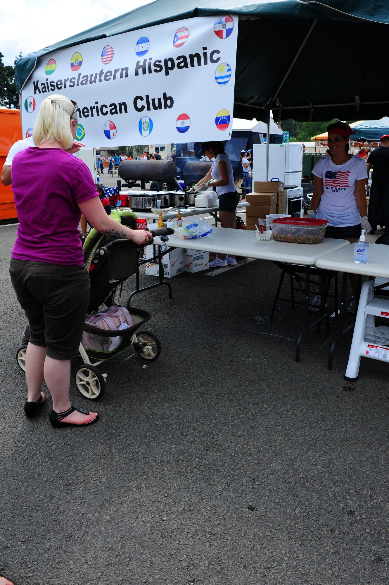 Members of the Kaiserslautern Hispanic-American Club serve traditional Hispanic food to members of Team Ramstein at the 86th Force Support Squadron’s annual Kaiserslautern Military Community Independence Day celebration, “The Rockin’ 4th,” at the Enlisted Club on Ramstein Air Base, Germany, July 4, 2012. The club served up the food to celebrate July 4th with the mission to spread out the Hispanic culture to members of the Kaiserslautern Military Community. (U.S. Air Force photo/Airman 1st Class Holly Cook)
