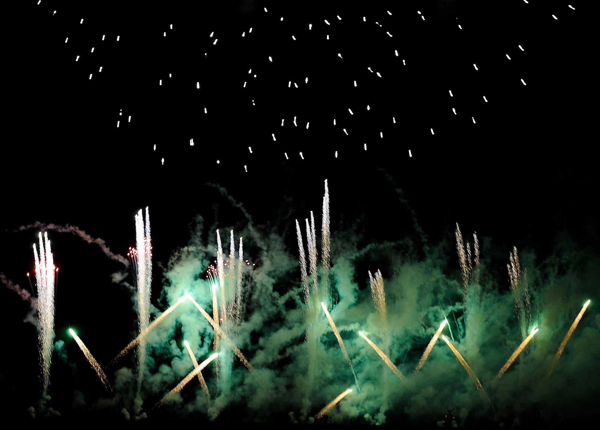 ROYAL AIR FORCE FELTWELL, England - Fireworks light the sky during the Independence Day celebration here July 4, 2012. Approximately 30,000 people came together to celebrate America's Independence Day. Attendees enjoyed a variety of food, played games, witnessed aerial displays, rode carnival rides and watched fireworks. (U.S. Air Force by Senior Airman Connor Estes)