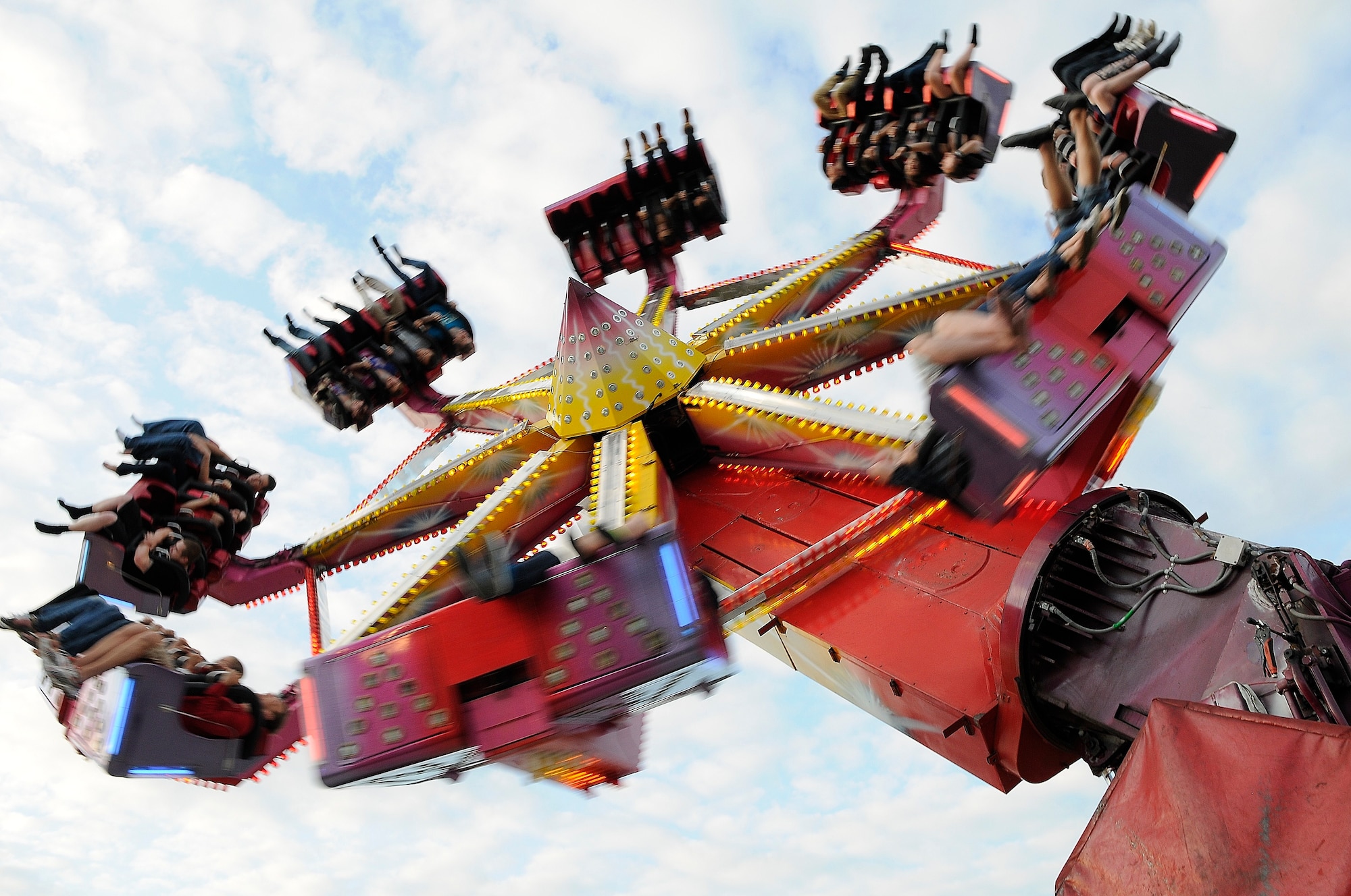 ROYAL AIR FORCE FELTWELL, England - Celebration participants go on a ride during the Independence Day celebration here July 4, 2012. Approximately 30,000 Airmen, their families and U.K. residents came together to celebrate America's Independence Day. Attendees enjoyed a variety of food, played games, witnessed aerial displays, rode carnival rides and watched fireworks. (U.S. Air Force by Senior Airman Connor Estes)
