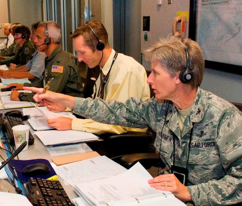Col. Loretta Kelemen, 45th Mission Support Group Commander, worked the console at the Morrell Operations Center for both NRO launches. The colonel retires from the Air Force today.