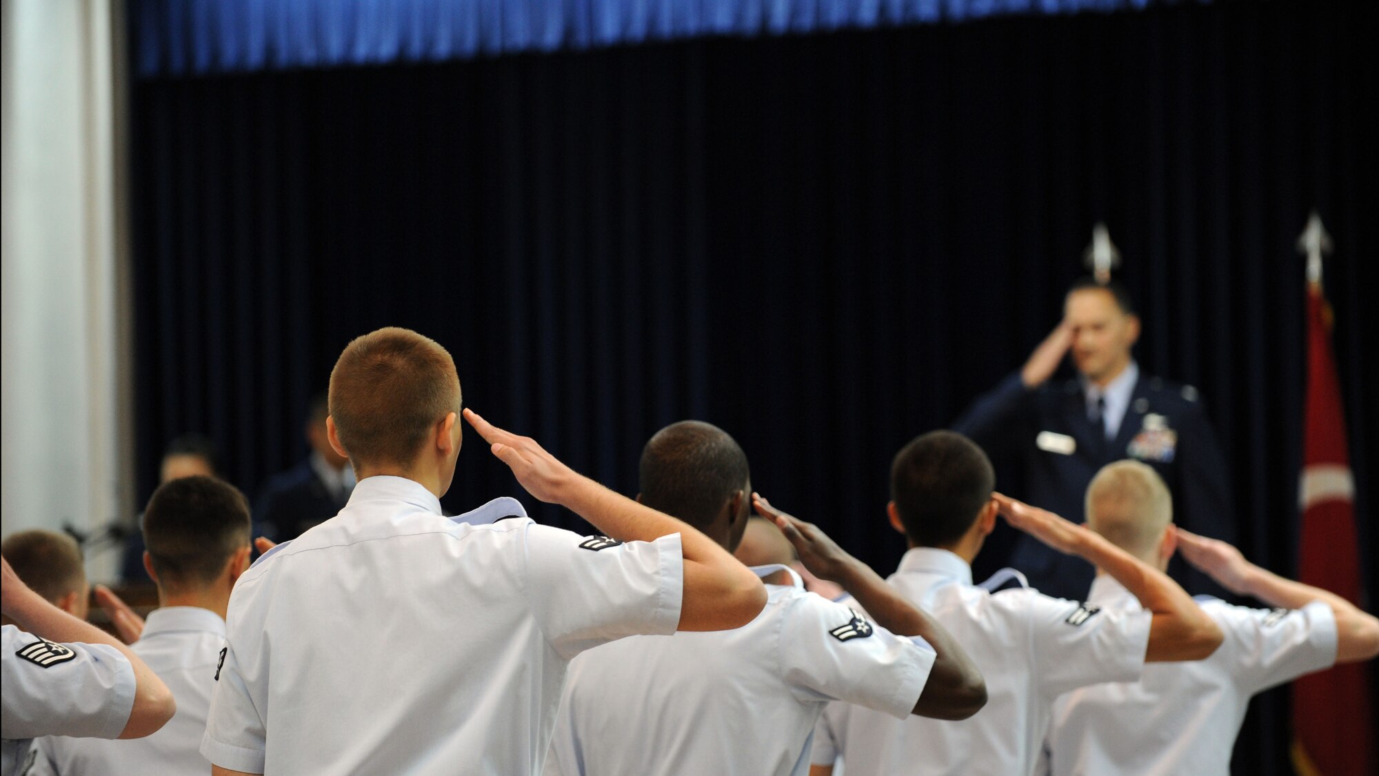 Members of the 39th Communications Squadron render their first salute to Lt. Col. James Skelton, incoming 39th Communications Squadron commander, during the 39th CS change-of-command ceremony July 6, 2012, at Incirlik Air Base, Turkey. Members of the 39th CS bid farewell to Lt. Col. Patrick Daniel and welcomed Lt. Col. James Skelton as their new squadron commander. (U.S. Air Force photo by Senior Airman Jarvie Z. Wallace/Released