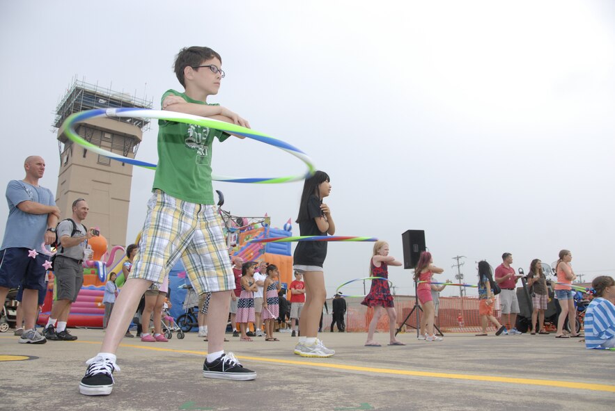 Children of Osan families competed in a hula-hoop contest mid-way through the Liberty Fest schedule. The winner was Elijah Davidson, son of Maj. Kevin Davidson, who is attending the Republic of Korea Command and Staff College in Daejon. The family traveled in to celebrate the American holiday. (U.S. Air Force photo/Senior Master Sgt. Stuart Camp)