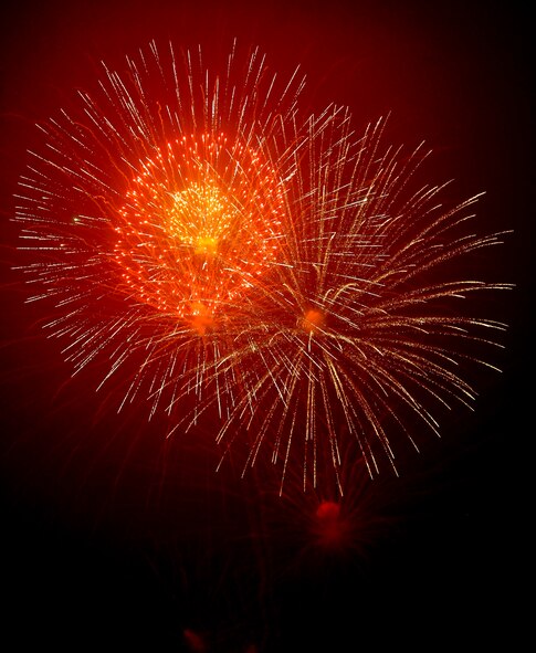 Fireworks light up the sky as Team Osan celebrates Independence Day, July 4, 2012, during the annual Liberty Fest. The 51st Force Support Squadron hosted various events throughout the day to include live bands, golf tournaments and a fireworks display. Traditional Korean performances and American food were also a part of festivities. (U.S. Air Force photo/Staff Sgt. Stefanie Torres)