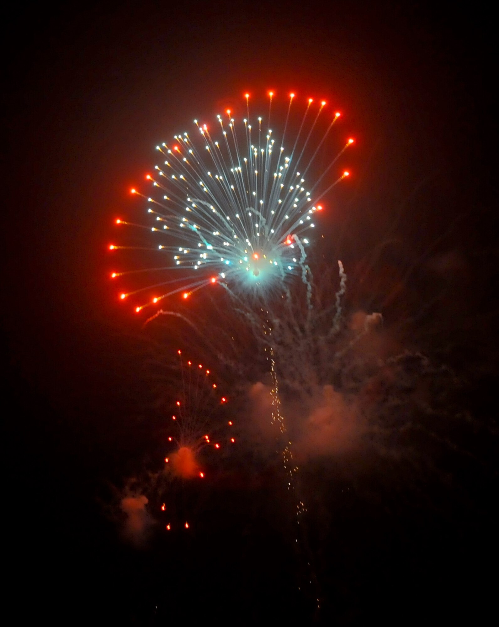 Fireworks light up the sky as Team Osan celebrates Independence Day, July 4, 2012, during the annual Liberty Fest. The 51st Force Support Squadron hosted various events throughout the day to include live bands, golf tournaments and a fireworks display. Traditional Korean performances and American food were also a part of festivities. (U.S. Air Force photo/Staff Sgt. Stefanie Torres)