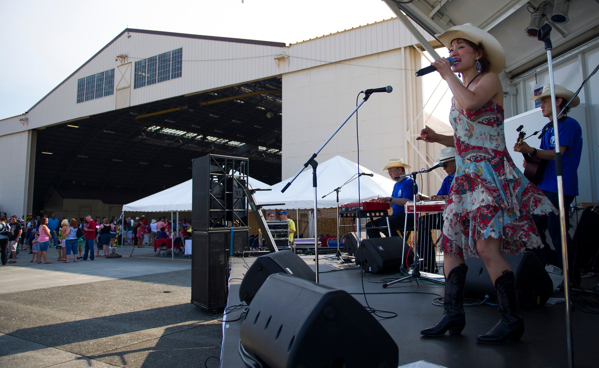 YOKOTA AIR BASE, Japan -- A Japanese band plays American country songs near Hangar 15 during the Celebrate America event held July 4, 2012, at Yokota Air Base, Japan. The festivities also included face painting, carnival games, arts and crafts, and a fireworks show. (U.S. Air Force photo by Staff Sgt. Chad C. Strohmeyer)