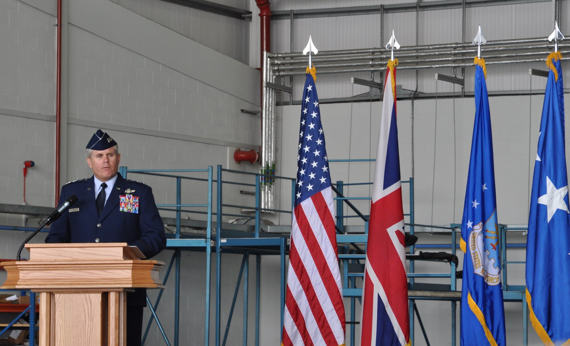 Lt. Gen. Eric E. Fiel, Air Force Special Operations Command commander, officiates the 352nd Special Operations Group change of command ceremony at RAF Mildenhall, England, in Hangar 814 July 6, 2012. McCollum relinquished command of the unit to Col. Christopher Ireland, a senior pilot with more than 3,000 flying hours in multiple airframes, including the MC-130 E/H Combat Talon. (U.S. Air Force photo/Staff Sgt. Thomas Trower)