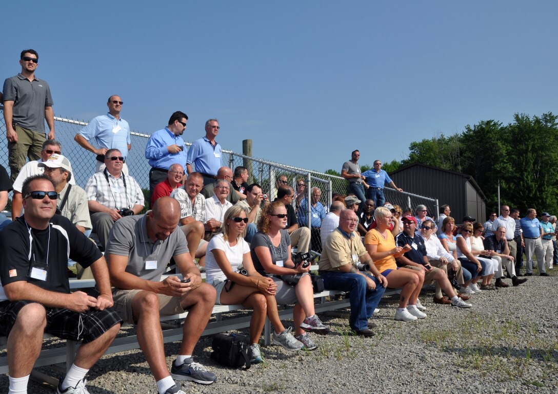 YOUNGSTOWN AIR RESERVE STATION, Ohio—Employers of Youngstown Air Reserve Station (YARS) service members watch a demonstration by Security Forces members, here, July 8. The employers were at YARS for Employer Awareness Day, which allows service members’ employers to learn more about the mission at YARS, watch different demonstrations and flew on a C-130. U.S. Air Force photo by Staff Sgt. Valerie Smock