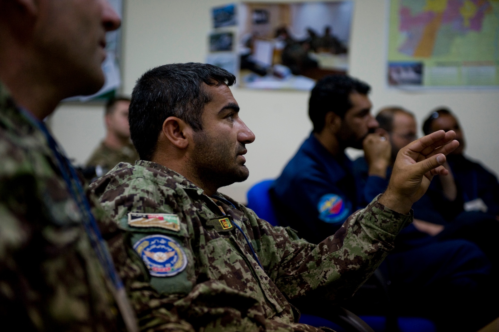 A member of the Afghan air force asks a question about different gauged wires during a training class in Kabul, Afghanistan on July 7, 2012. Afghan air force Electrical and Radio C-27A maintainers took part in the four-day class to learn the tools, safety procedures and practical hands-on application of electrical aircraft wiring.(U.S. Air Force photo by Staff Sgt. Greg C. Biondo)(Released)