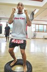 Senior Airman James Turner, 51st Maintenance Group aircraft metal technology journeyman, performs agility drills with a tire before sparring June 18, 2012. Turner has been participating in Muay Thai at the Moo Bong Gym for about three months and goes there five times a week for two hours per session. (U.S. Air Force photo/Senior Airman Adam Grant)
