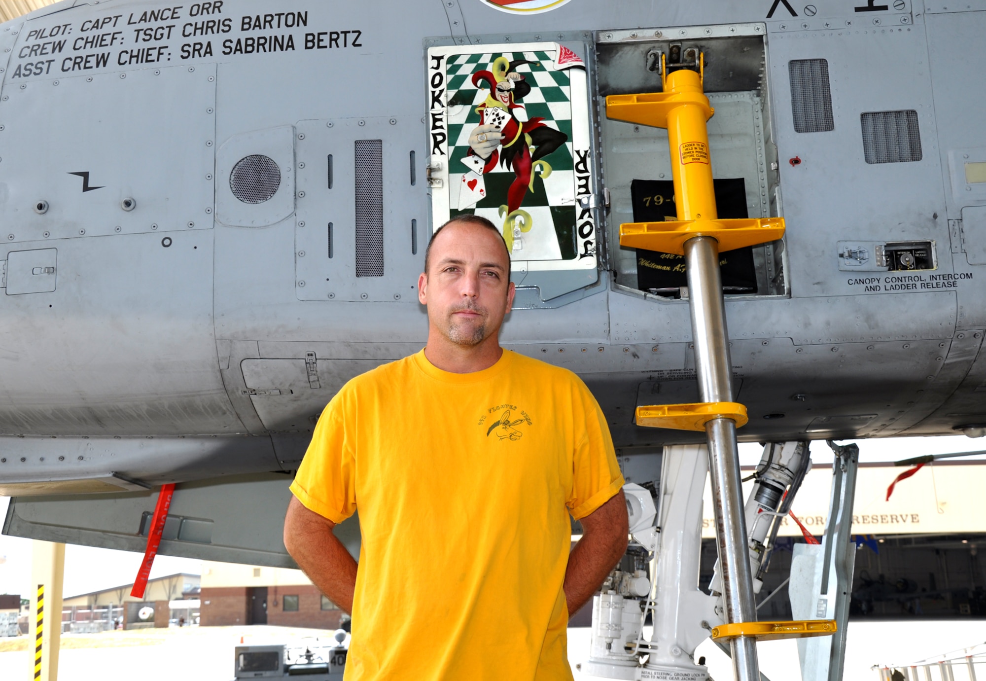 Tech. Sgt. Chris Barton, 442nd Aircraft Maintenance Squadron crew chief, displays his door-art here on his assigned A-10 Thunderbolt II. A joker from a deck of cards wears a ring with the 442nd Fighter Wing shield and holds an ace and a ten symbolizing A-10 pride. Barton began doing door-art during Desert Storm in 1991. The 442nd AMXS is part of the 442nd Fighter Wing, an A-10 Thunderbolt II Air Force Reserve unit at Whiteman Air Force Base, Mo. (U.S. Air Force photo/Tech. Sgt. Kent Kagarise)   