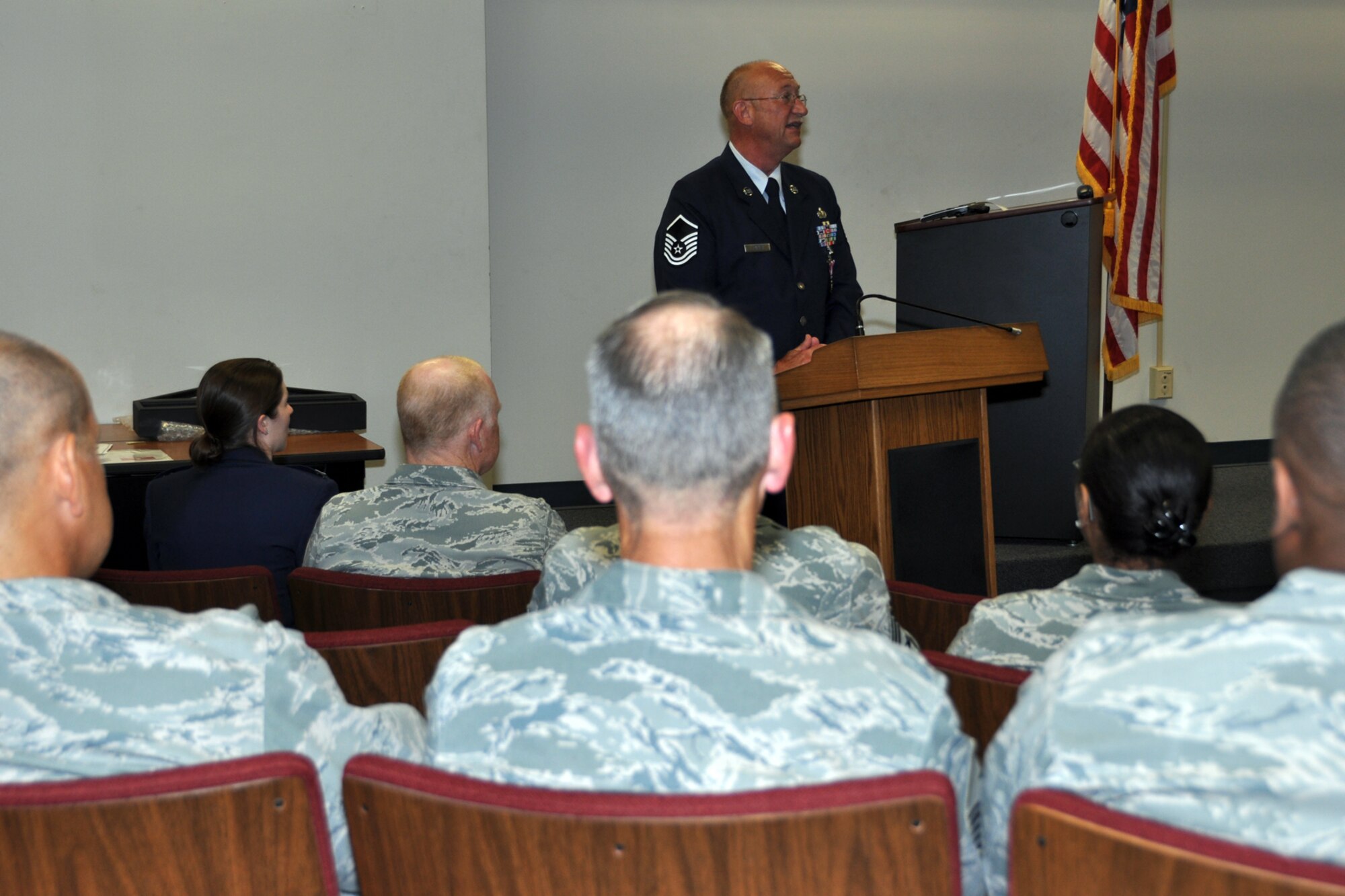 Retired U.S. Air Force Master Sgt. Harold Starkey speaks to his family, friends, neighbors and former co-workers during his retirement ceremony at Barksdale Air Force Base, La., July 8, 2012. Starkey, who was the 307 MSG career advisor, also served as the Yellow Ribbon Program Manager for the wing. During his 33 years of service to his country, Starkey served in the Air Force as well as the Texas Army National Guard. (U.S. Air Force photo by Master Sgt. Jeff Walston)