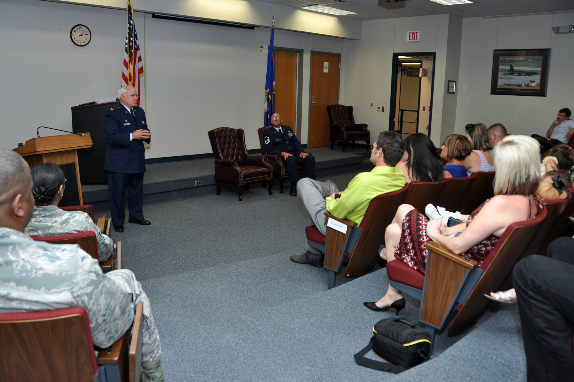Family, friends, neighbors and co-workers listen to Col. Kevin Wolfe, the 307th Mission Support Group commander as he speaks at the retirement ceremony of Master Sgt. Harold Starkey at Barksdale Air Force Base, La., July 8, 2012. Starkey, who was the 307 MSG career advisor, also served as the Yellow Ribbon Program Manager for the wing. During his 33 years of service to his country, Starkey served in the Air Force as well as the Texas Army National Guard. (U.S. Air Force photo by Master Sgt. Jeff Walston)