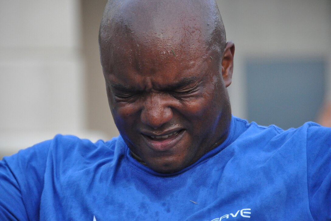 All eyes are on the instructor during a round of pushups completed by 307th Development and Training Flight trainees during the Unit Training Assembly at Barksdale Air Force Base, La., July 8, 2012. Ten-hour days begin at 6 a.m. for the trainees with a block of instruction on physical fitness. (U.S. Air Force photo by Staff Sgt. Ted Daigle/Released)