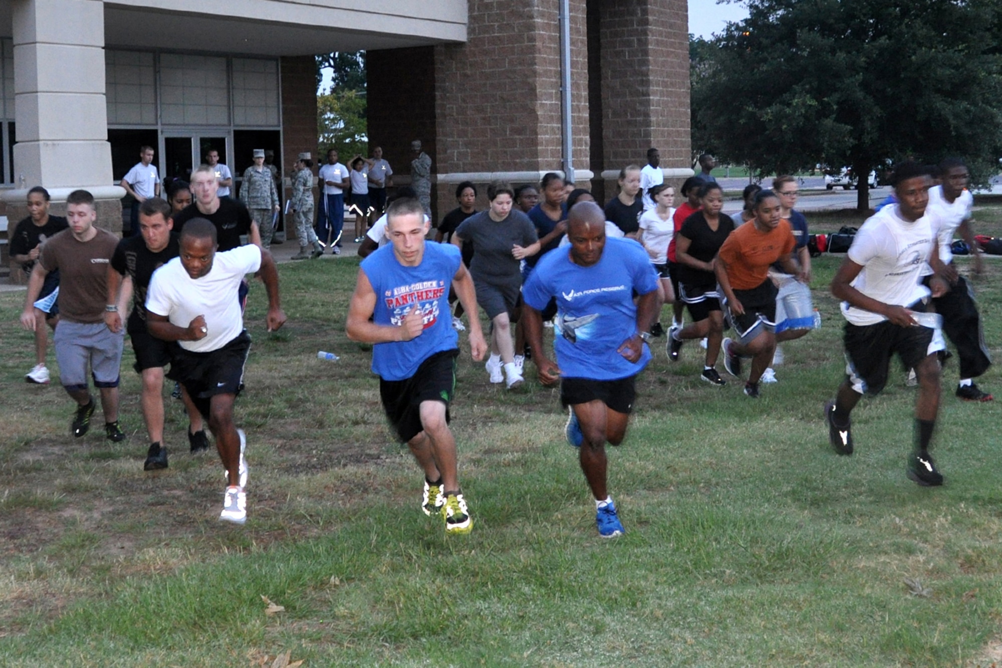 Trainees with the 307th Development and Training Flight head out for a run during the Unit Training Assembly at Barksdale Air Force Base, La., July 8, 2012.  In order to prepare for the rigors of Basic Military Training, trainees begin each morning of the UTA with an intensive block of instruction on physical fitness and training. (U.S. Air Force photo by Staff Sgt. Ted Daigle/Released)
