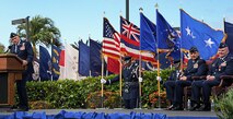 Col. Johnny Roscoe, incoming 15th Wing commander, delivers his first remarks as 15 WG commander upon his assumption of command during the Change of Command ceremony July 6 at Joint Base Pearl Harbor-Hickam, Hawaii. During the ceremony, command of the 15th WG passed from Col. Sam Barrett to Roscoe. (U.S. Air Force photo by Senior Airman Lauren Main)