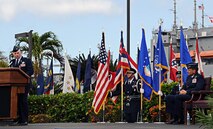 Lt. Gen. Ted Kresge, 13th Air Force commander (right), listens as Col.Sam Barrett (left), outgoing 15th Wing commander, makes his final remarks as 15 WG commander during a Change of Command ceremony July 6 at Joint Base Pearl Harbor-Hickam, Hawaii. During the ceremony, command of the 15th WG passed from Barrett to Col. Johnny Roscoe.(U.S. Air Force photo by Senior Airman Lauren Main)