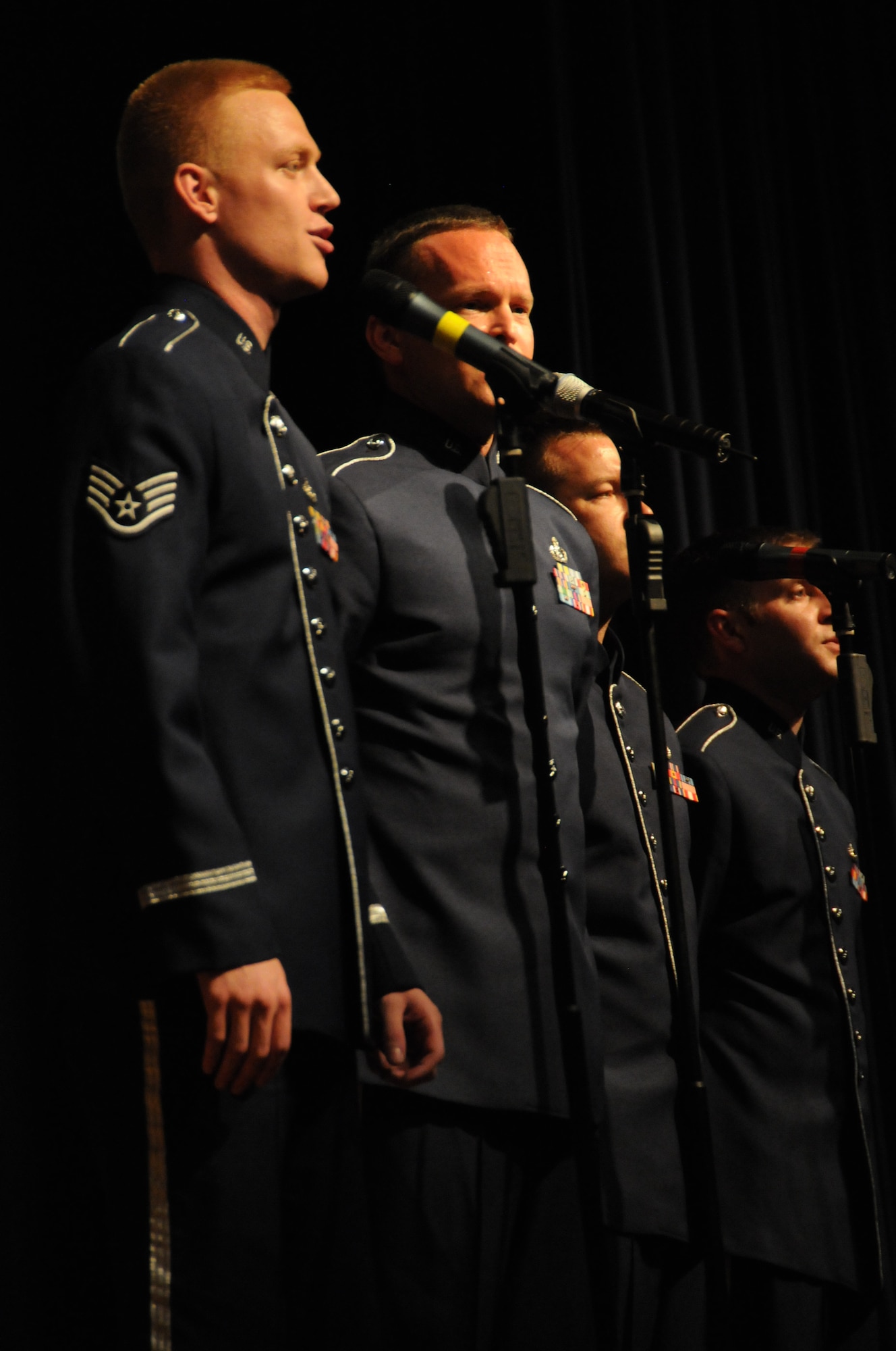 The 555th Air Force Band, also known as the Triple Nickel and Air National Band of the Great Lakes, performs their last concert at Anthony Wayne High School in Whitehouse, Ohio, July 7, 2012.  The Triple Nickel band was deactivated after 90 years of service as part of the Ohio Air National Guard.  (U.S. Air Force photo by Senior Airman Amber Williams/Released)