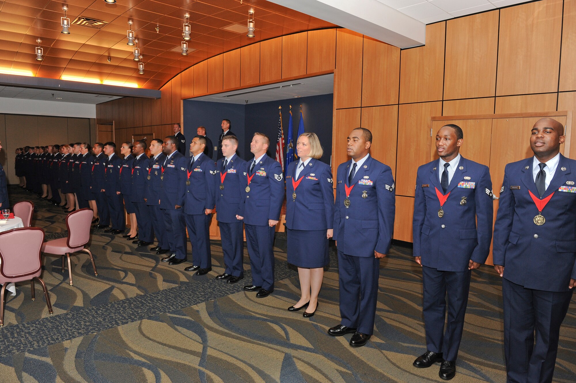 Twenty-one Tyndall Airmen graduated from Airmen Leadership School in a ceremony July 3, at the Horizons Community Activity Center. (U.S. Air Force photo by Chris Cokeing)

