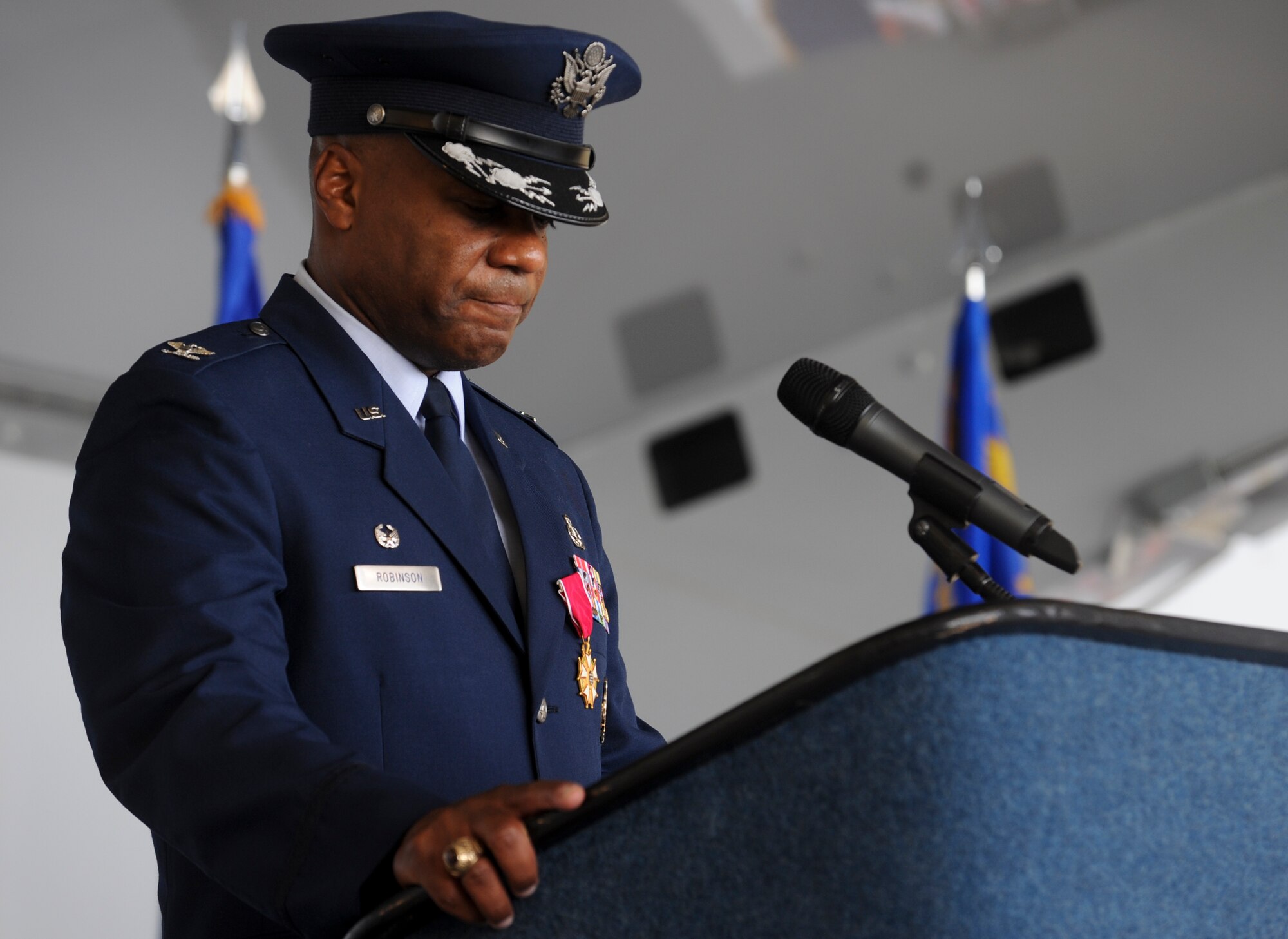 U.S. Air Force Col. Neal Robinson, 23d Maintenance Group commander, gives his final speech before relinquishing command at Moody Air Force Base, Ga., July 6, 2012. During his speech, Robinson thanked his family for their continued support. (U.S. Air Force photo by Airman 1st Class Douglas Ellis/Released)
