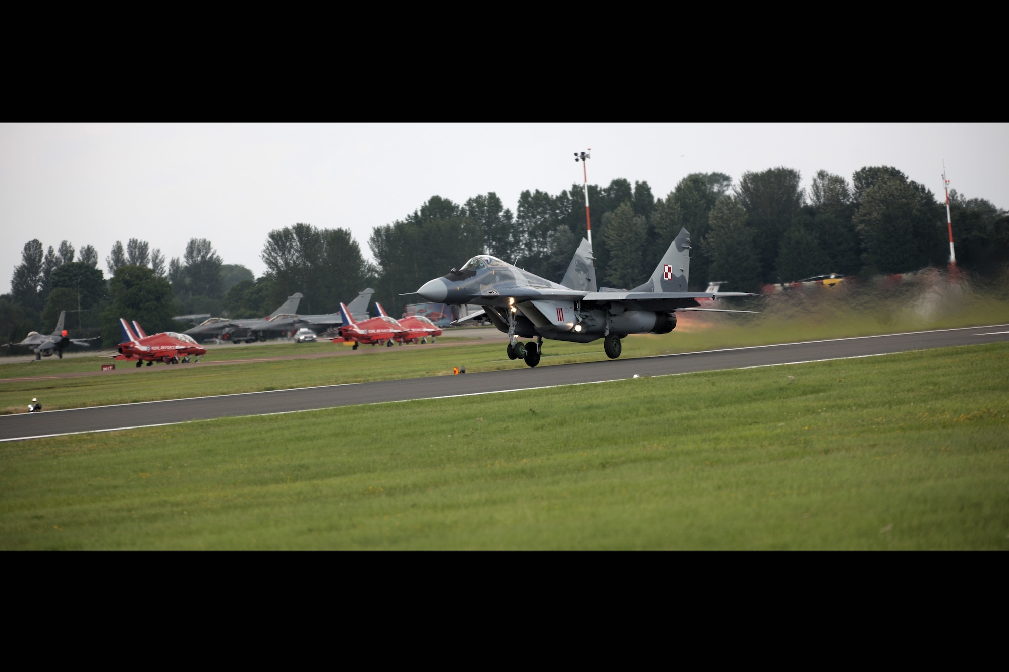 RAF FAIRFORD, United Kingdom - A Polish MiG-29 takes off during the Royal International Air Tattoo here July 8. More than 130,000 people attended the tattoo. (U.S. Air Force photo by Master Sgt. John Barton)