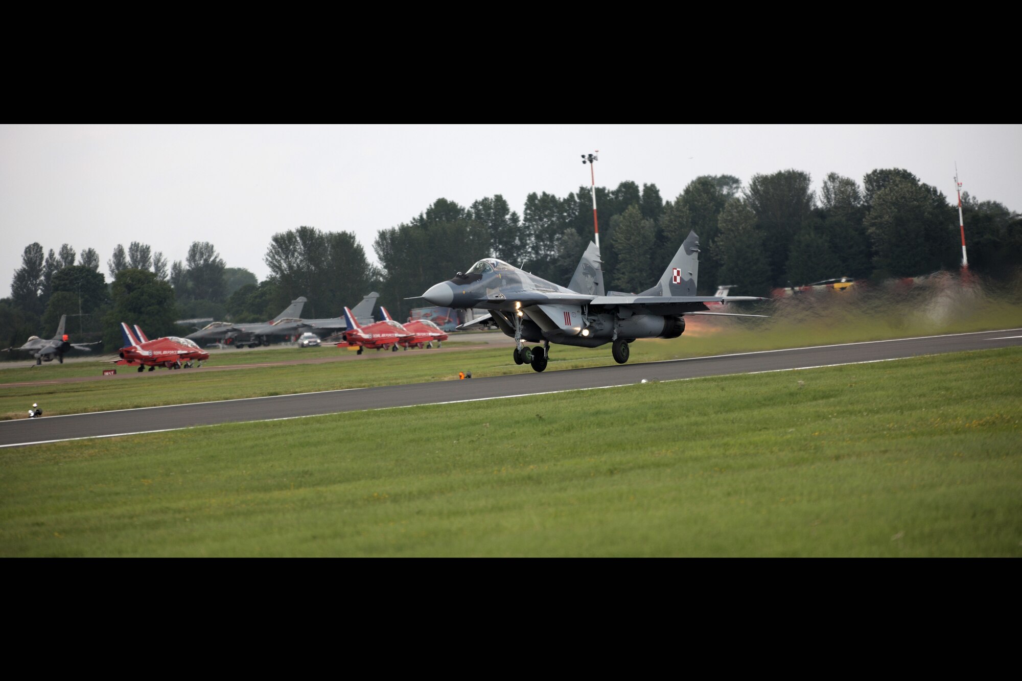 RAF FAIRFORD, United Kingdom - A Polish MiG-29 takes off during the Royal International Air Tattoo here July 8. More than 130,000 people attended the tattoo. (U.S. Air Force photo by Master Sgt. John Barton)