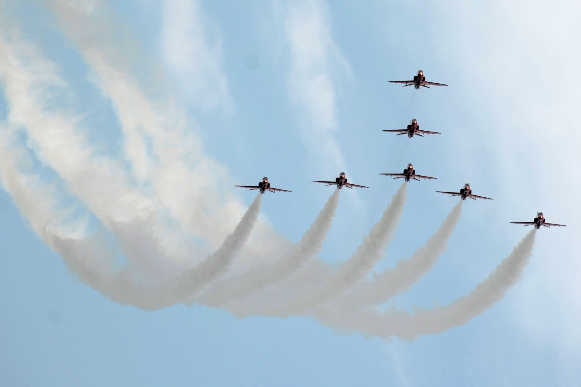 RAF FAIRFORD, United Kingdom - The Royal Air Force Red Arrows perform during the Royal International Air Tattoo here July 8. More than 130,000 people attended the tattoo. (U.S. Air Force photo by Master Sgt. John Barton)