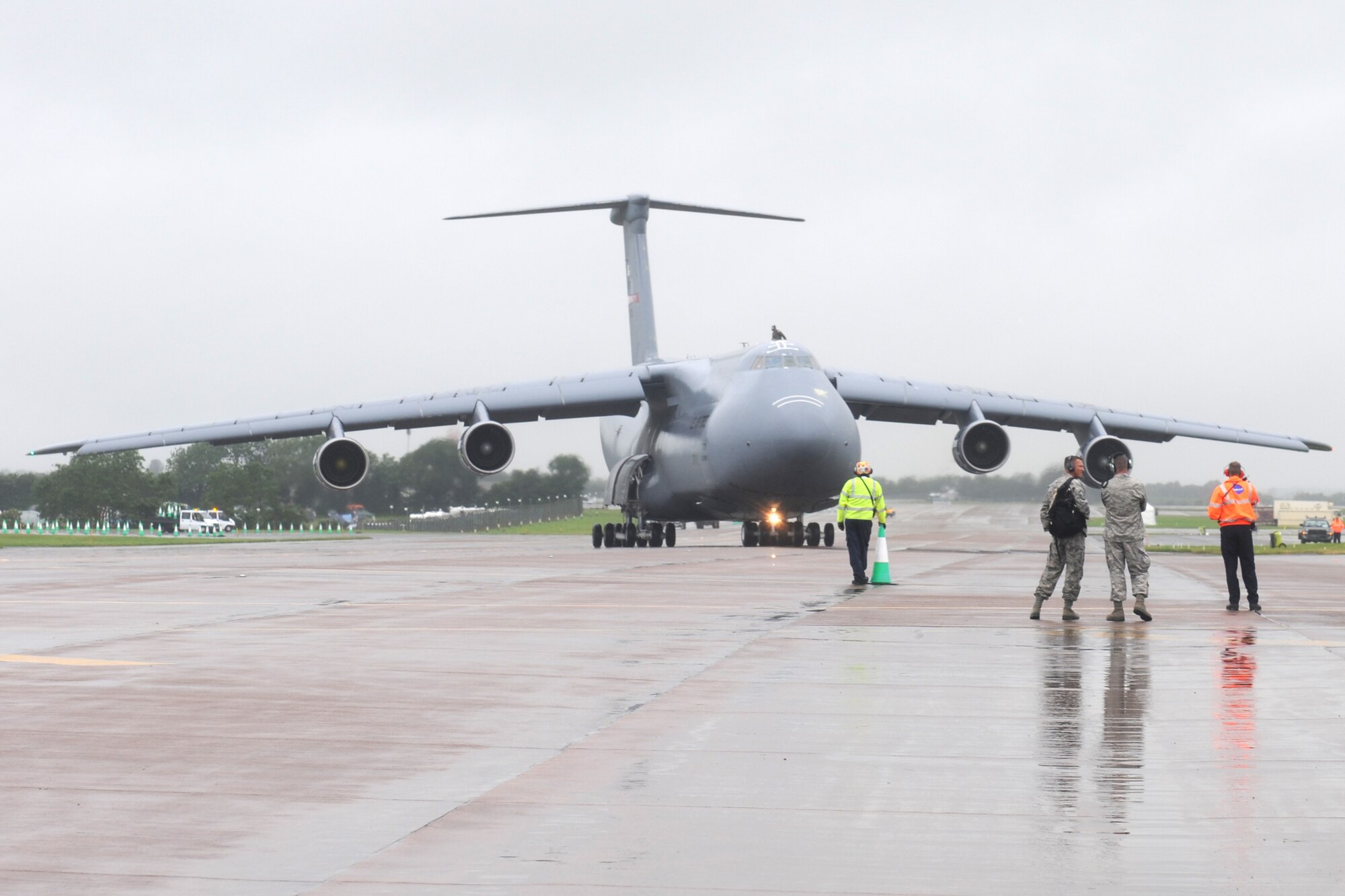 RAF FAIRFORD, United Kingdom - A Westover Air Reserve Base C-5 Galaxy lands at the Royal International Air Tattoo July 4 here. The C-5 is the largest plane in the Air Force inventory. (U.S. Air Force photo by Capt. Brian Maguire)