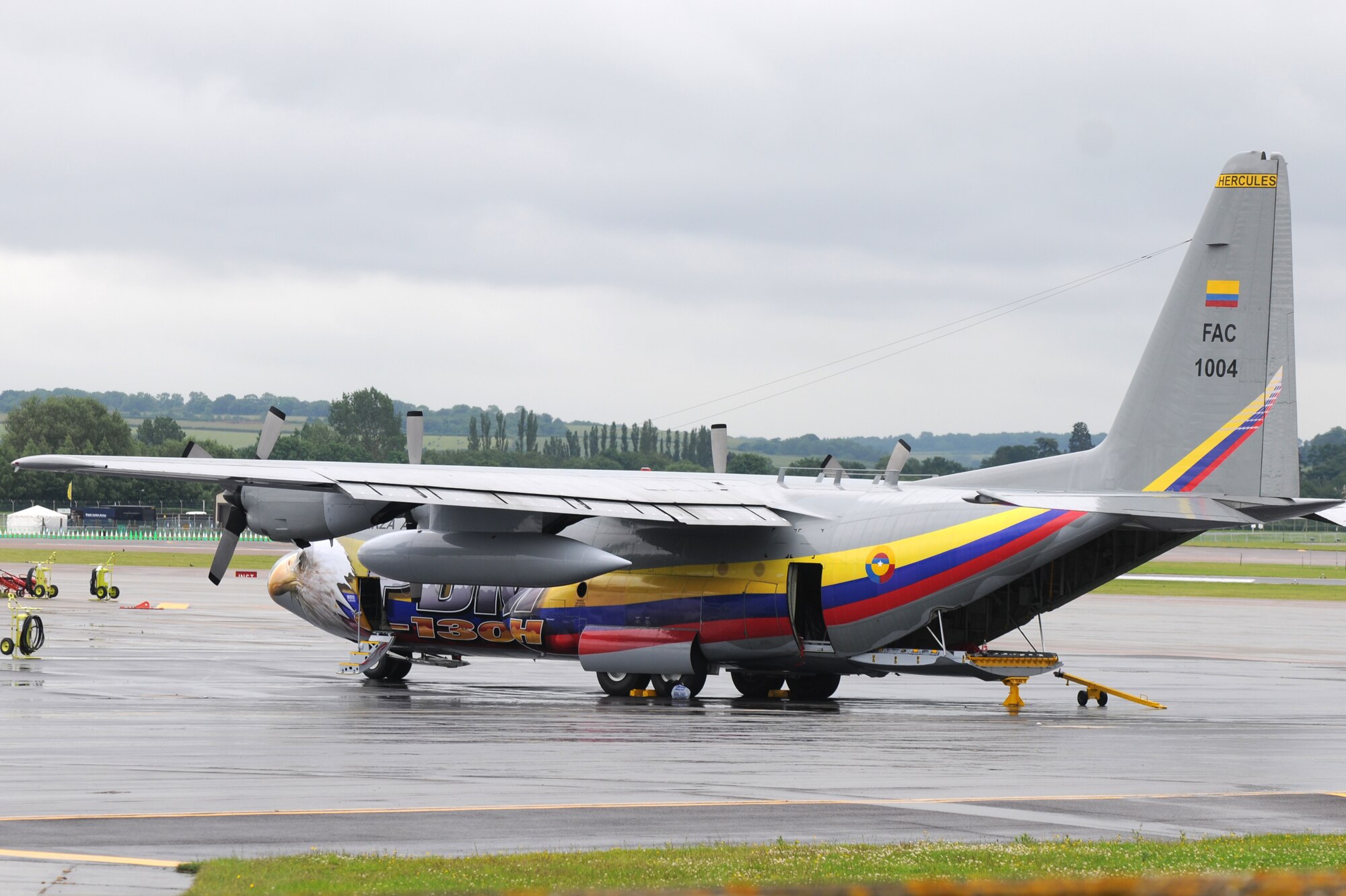 RAF FAIRFORD, United Kingdom - The first aircraft, a Columbian C-130, arrives for the Royal International Air Tattoo July 3 here. (U.S. Air Force photo by Capt. Brian Maguire)