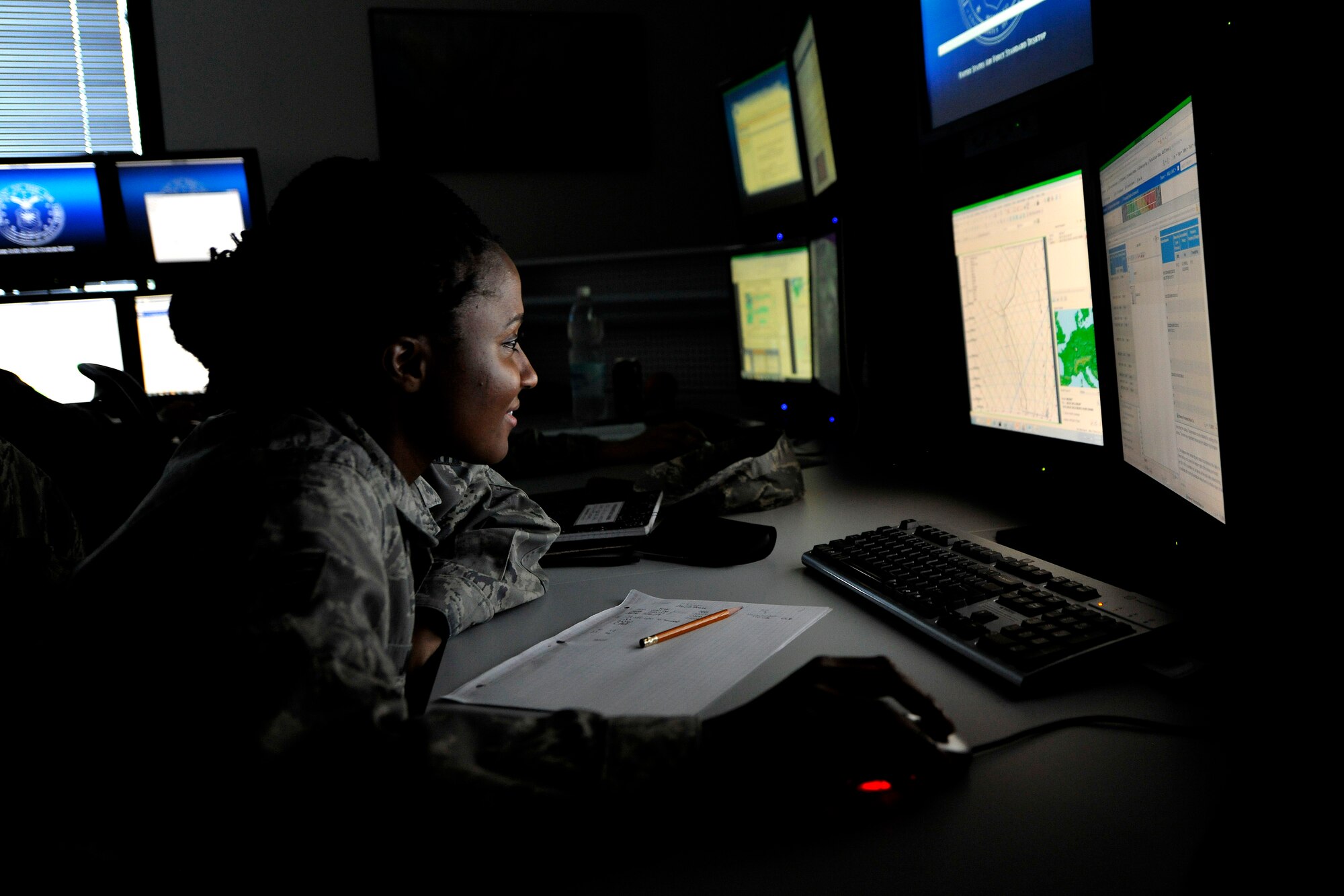 Staff Sgt. Jamila Jahic, 21st Operational Weather Squadron synoptic forecaster, creates and reviews weather hazard charts on Kapuan Air Station, Germany, July 6, 2012.  Training is critical to the 21st OWS due to all new weather forecasters, enlisted and officer, coming to the OWS as their first weather assignment directly from technical training.  (U.S. Air Force photo/Senior Airman Chris Willis)