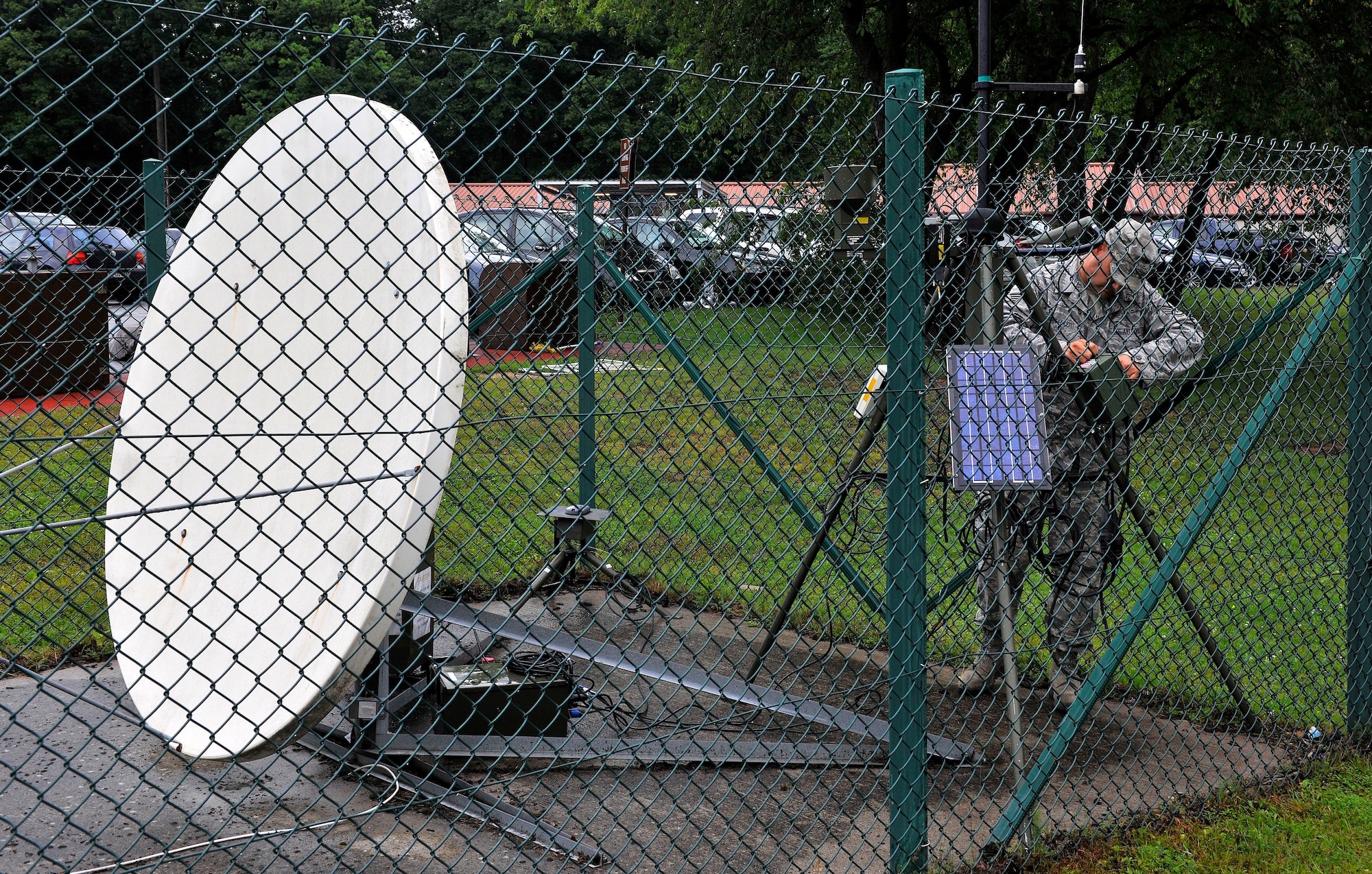 Staff Sgt. Robert Whittaker, 21st Operational Weather Squadron Mark IVB Satellite System NCOIC, performs an operations check on a Meteorological Data Station on Kapuan Air Station, Germany, July 6, 2012. The 21st OWS operates with more than 200 assigned personnel providing routine flight weather briefings for senior weather leaders along with five day forecasts to help keep more than 50K personnel informed of expected weather conditions and aid in protecting over $30 billion worth of DoD assets.  (U.S. Air Force photo/Senior Airman Chris Willis)