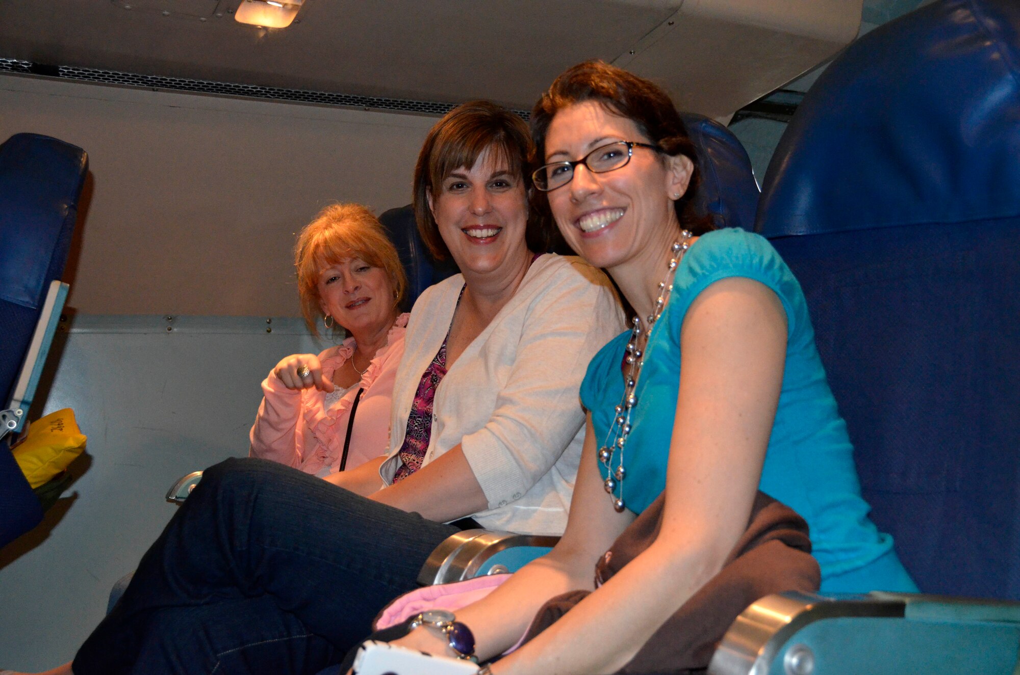 Twenty-eight military spouses got a glimpse of what their husbands and wives do on a mission during the 439th Airlift Wing's Spouse Orientation Flight May 24. (U.S. Air Force photo/SrA. Kelly Galloway)