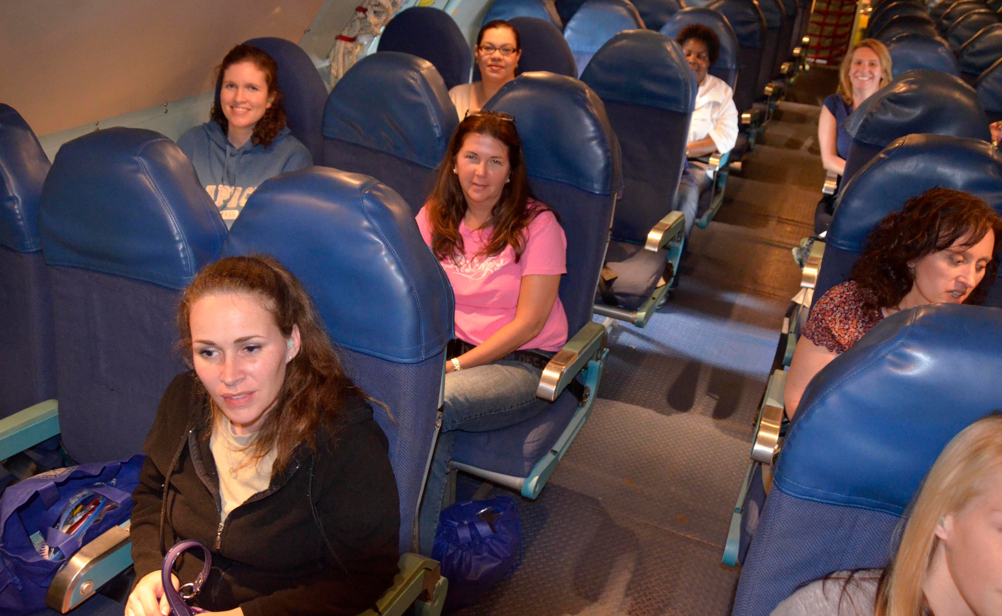 Twenty-eight military spouses got a glimpse of what their husbands and wives do on a mission during the 439th Airlift Wing's Spouse Orientation Flight May 24. (U.S. Air Force photo/SrA. Kelly Galloway)