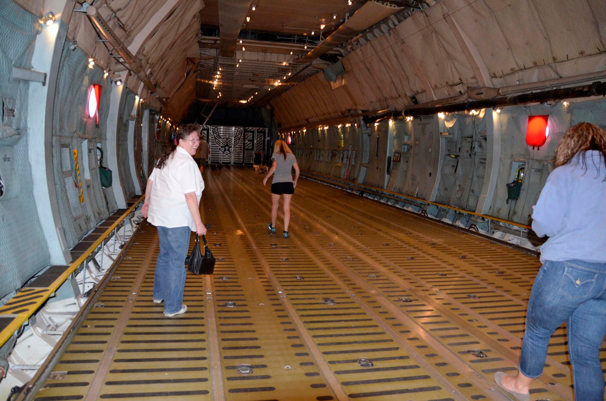 Twenty-eight military spouses got a glimpse of what their husbands and wives do on a mission during the 439th Airlift Wing's Spouse Orientation Flight May 24. (U.S. Air Force photo/SrA. Kelly Galloway)