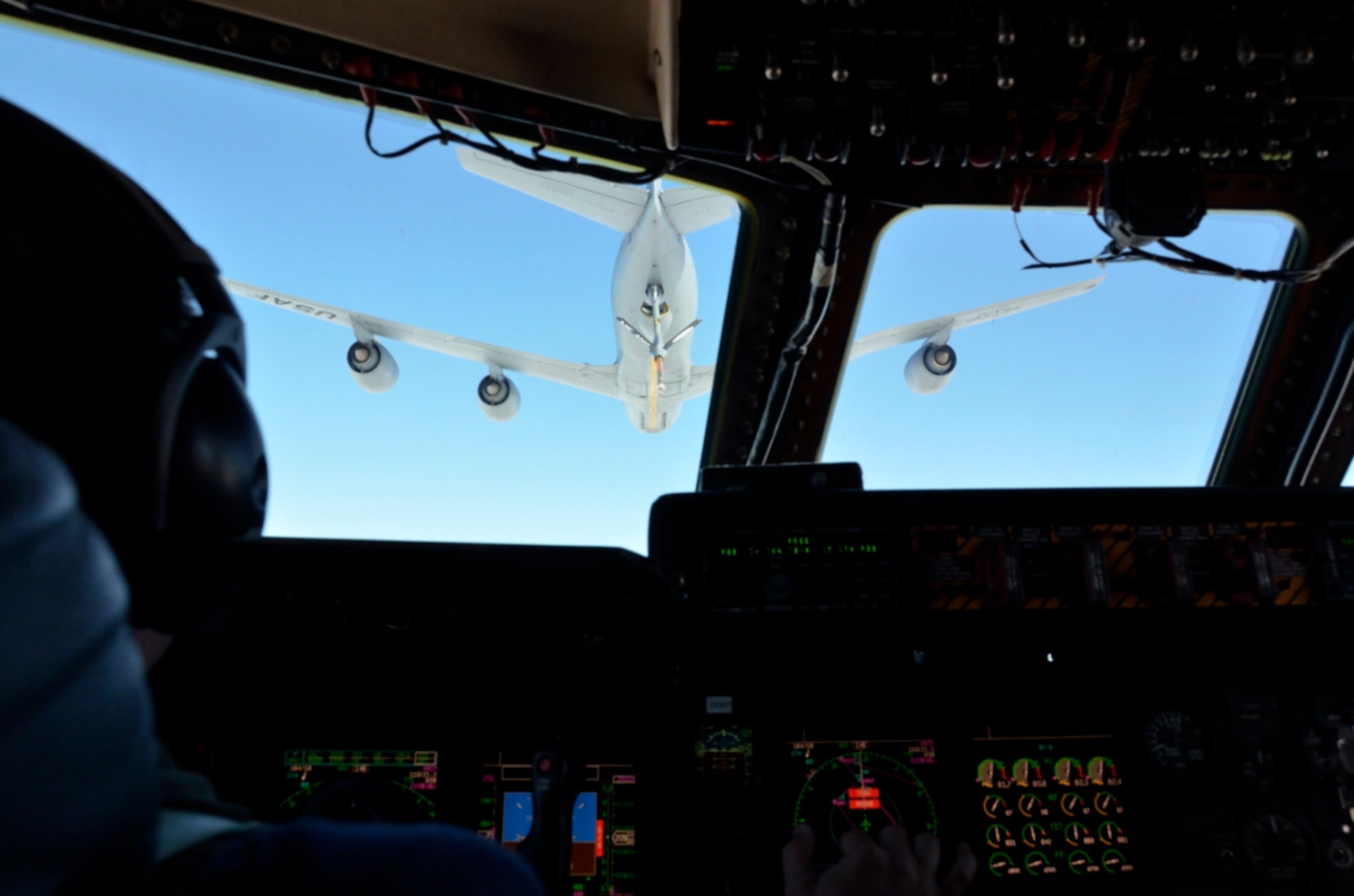Twenty-eight military spouses got a glimpse of what their husbands and wives do on a mission during the 439th Airlift Wing's Spouse Orientation Flight May 24. (U.S. Air Force photo/SrA. Kelly Galloway)