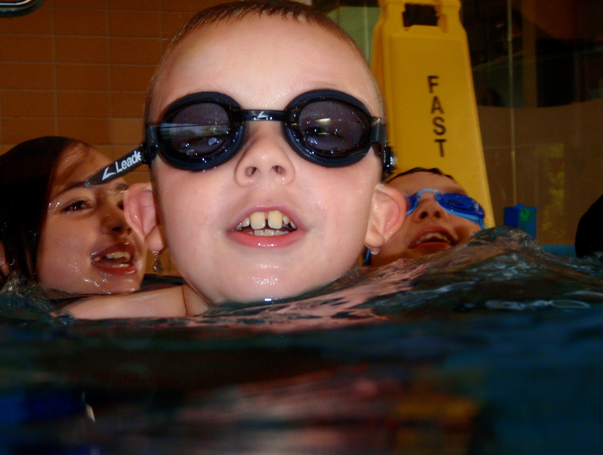 Gyrenn Precup treads water to warm up during his swim lesson at the Aquatics Center here June 29. Swim lessons teach children life-long skills of patience, practice, water safety and helps build social skills. (U.S. Air Force photo/Airman 1st Class Hailey Haux)