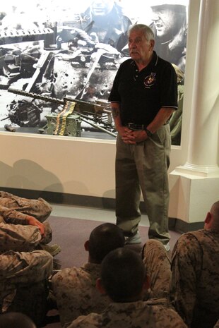 Arthur G. Barbosa, docent and retired Marine first sergeant, Command Museum, tells a story to recruits of Company A, 1st Recruit Training Battalion, during their visit to the museum aboard Marine Corps Recruit Depot San Diego June 27. Barbosa gave a detailed description to recruits of when he was deployed to Panmunjom, South Korea.