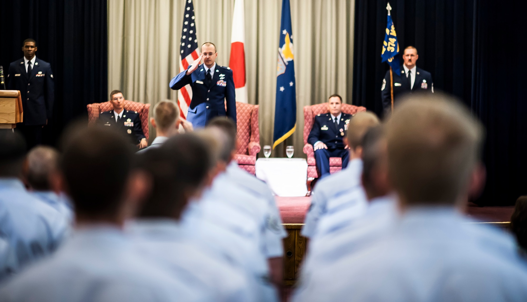 YOKOTA AIR BASE, Japan -- Lt. Col. Jon Autrey, 374th Communications Squadron commander, returns his first salute as commander during the 374 CS change of command ceremony at Yokota Air Base, Japan, July 6, 2012. (U.S. Air Force photo by Tech. Sgt. Samuel Morse)