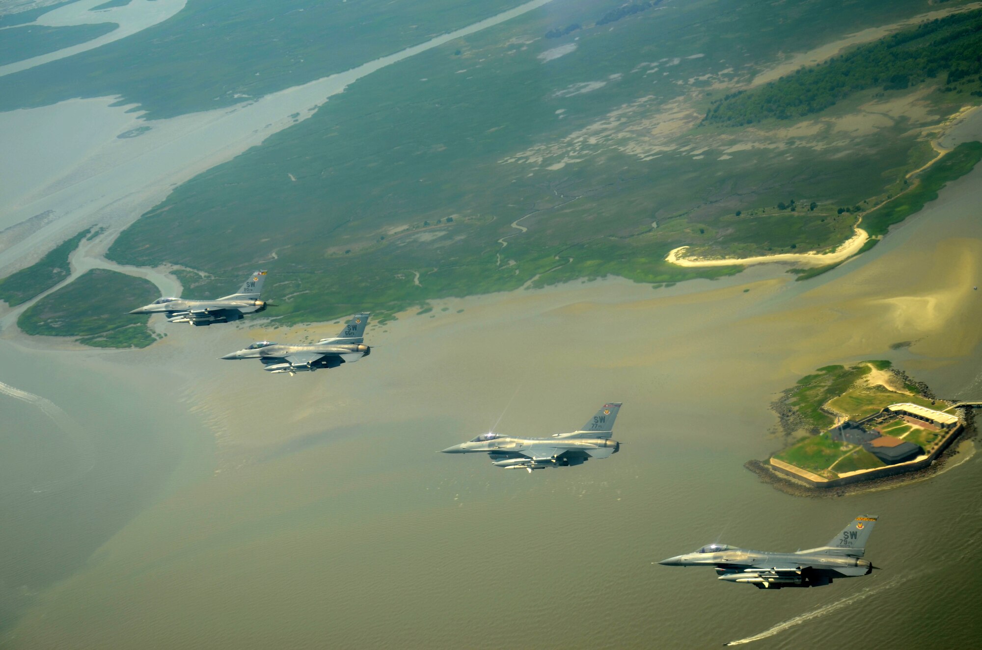 SHAW AIR FORCE BASE, S.C. - Four F-16 Vipers assigned to the 20th Fighter Wing, Shaw Air Force Base, S.C. fly over the Ft. Sumter, South Carolina as part of the Salute From the Shore tribute on July 4, 2012. Supporters of the U.S. military gathered along the Carolina coastline on Independence day and showed their support by building large flags and signs and cheered as Lt. Col Jason Plourde, Capt. Josh D. Larsen, Capt. Luke A. Bledsoe and Capt. John D. Ryan flew over head. (U.S.  Air Force photo by Master Sgt. Cohen A. Young/Released)