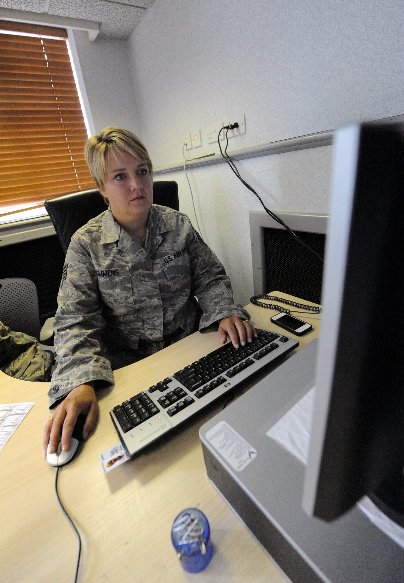 RAF MILDENHALL, England -- Staff Sgt. Carolyn Mommens, 442nd Logistics Readiness Squadron information technician, performs administrative duties, June 27, 2012. Mommens, along with approximately 50 other reservists from the squadron, was deployed here for training. The 442nd LRS is part of the 442nd Fighter Wing, an A-10 Thunderbolt II Air Force Reserve unit at Whiteman Air Force Base, Mo. (U.S. Air Force photo/Staff Sgt. Danielle Johnston)