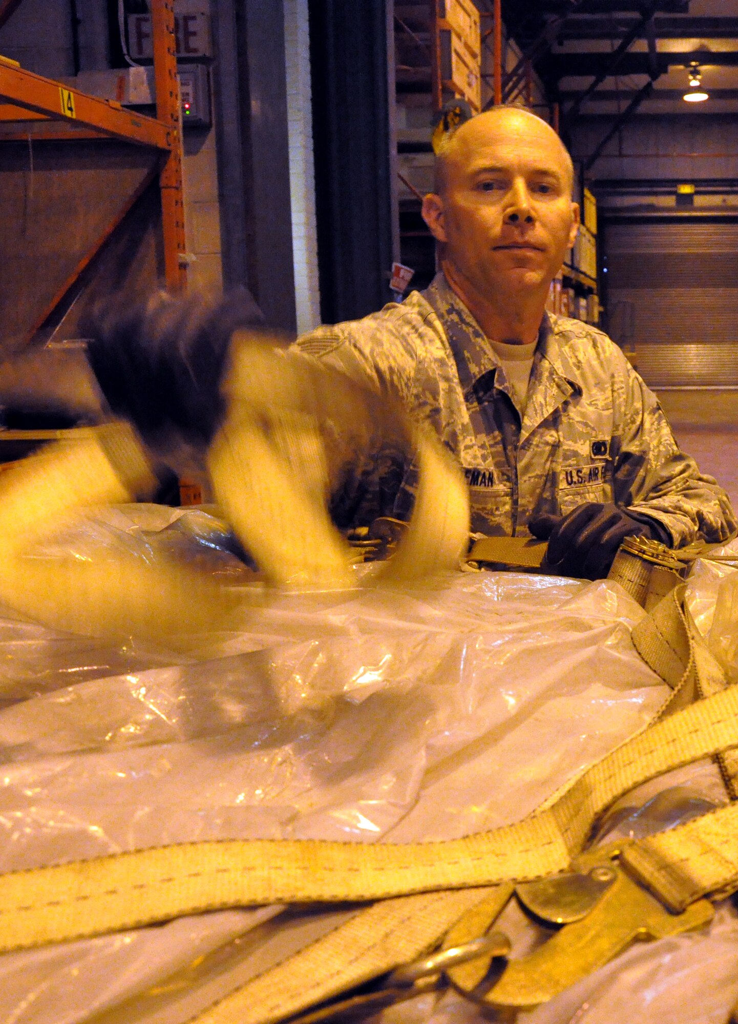 RAF MILDENHALL, England -- TSgt Shawn Lindeman, 442nd Logistics Readiness Squadron supply technicians, builds a pallet, July 2, 2012. Lindeman, along with approximately 50 other reservists from the squadron, was deployed here for training. The 442nd LRS is part of the 442nd Fighter Wing, an A-10 Thunderbolt II Air Force Reserve unit at Whiteman Air Force Base, Mo. (U.S. Air Force photo/Staff Sgt. Danielle Johnston)