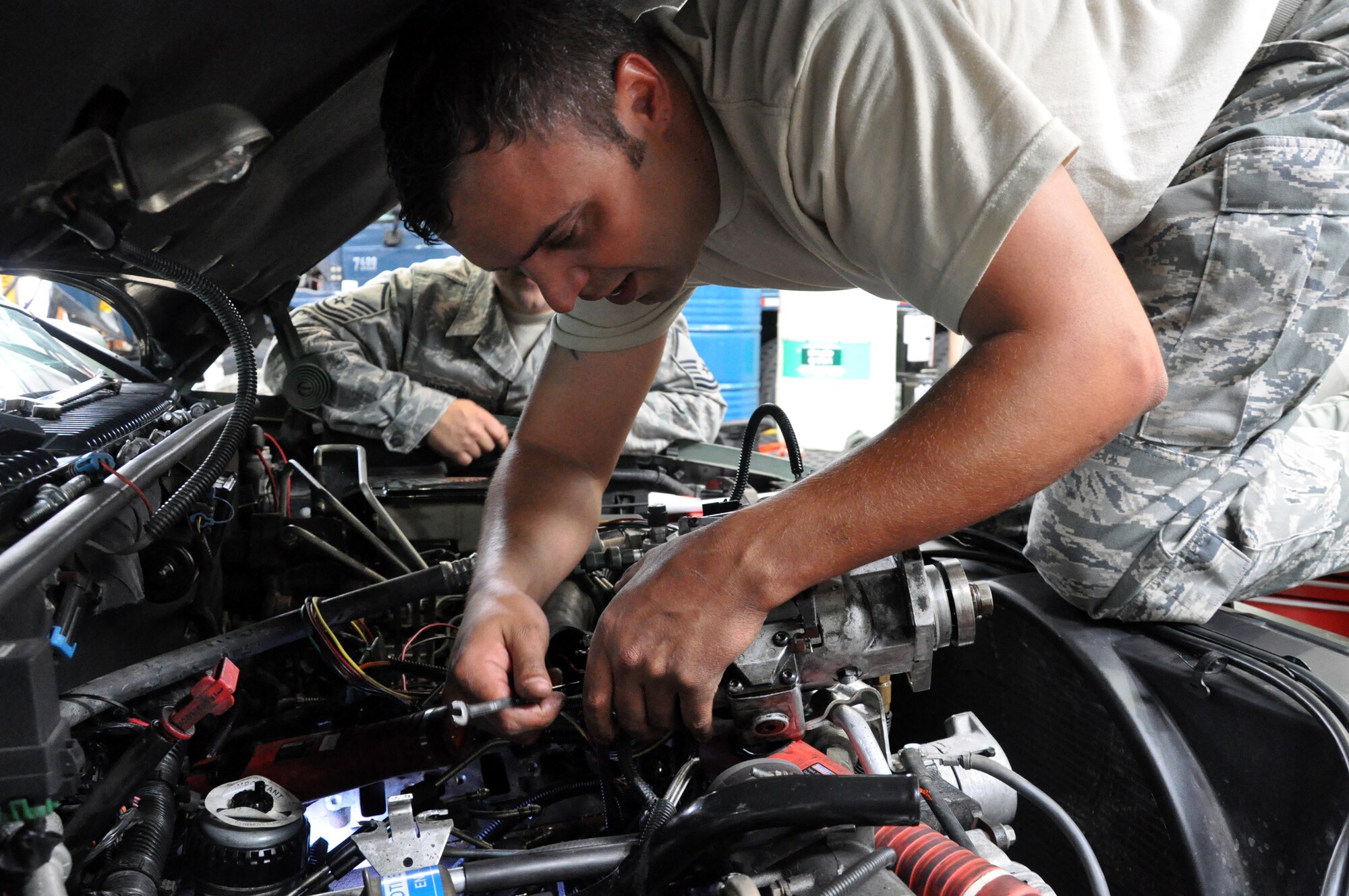 RAF MILDENHALL, England -- Senior Airman Rob Thomas, 442nd Logistics Readiness Squadron vehicle maintainer, fixes a vehicle previously deemed as terminal, June 26, 2012. Thomas, along with approximately 50 other reservists from the squadron, was deployed here for training. The 442nd LRS is part of the 442nd Fighter Wing, an A-10 Thunderbolt II Air Force Reserve unit at Whiteman Air Force Base, Mo. (U.S. Air Force photo/Staff Sgt. Danielle Johnston)