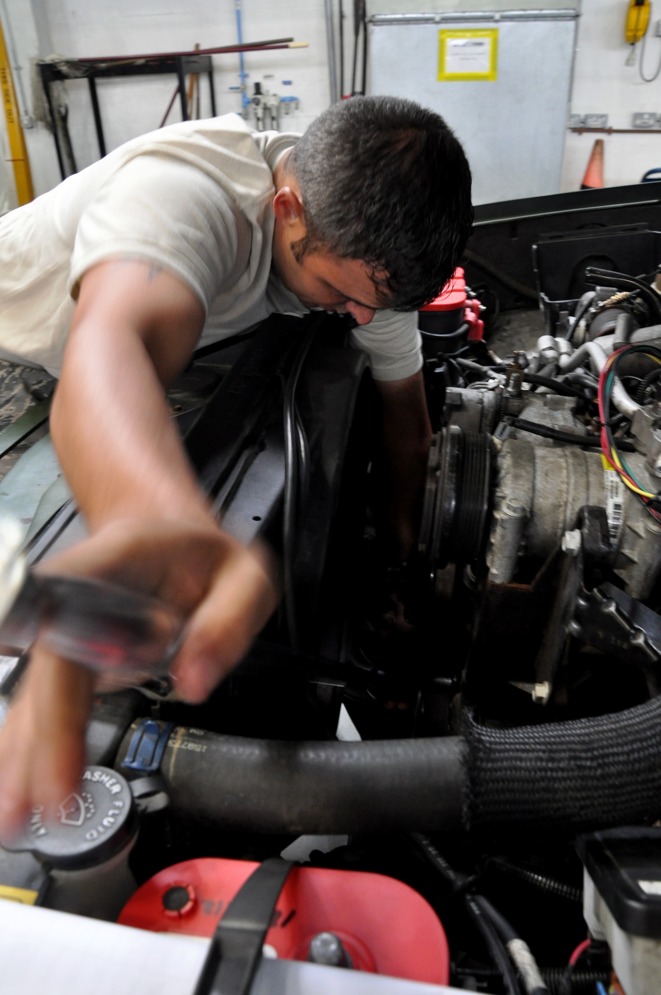 RAF MILDENHALL, England -- Senior Airman Rob Thomas, 442nd Logistics Readiness Squadron vehicle maintainer, fixes a vehicle previously deemed as terminal, June 26, 2012. Thomas, along with approximately 50 other reservists from the squadron, was deployed here for training. The 442nd LRS is part of the 442nd Fighter Wing, an A-10 Thunderbolt II Air Force Reserve unit at Whiteman Air Force Base, Mo. (U.S. Air Force photo/Staff Sgt. Danielle Johnston)