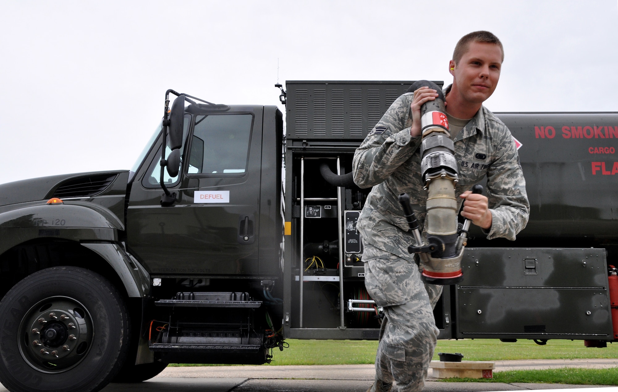 RAF MILDENHALL, England -- Airman 1st Class Kyle A. Clark, 442nd Logistics Readiness Squadron fuels technician, completes daily inspections on a refueling truck here, June 30, 2012. Clark, along with approximately 50 other reservists from the squadron, was deployed for training. The 442nd LRS is part of the 442nd Fighter Wing, an A-10 Thunderbolt II Air Force Reserve unit at Whiteman Air Force Base, Mo. (U.S. Air Force photo/Staff Sgt. Danielle Johnston)
