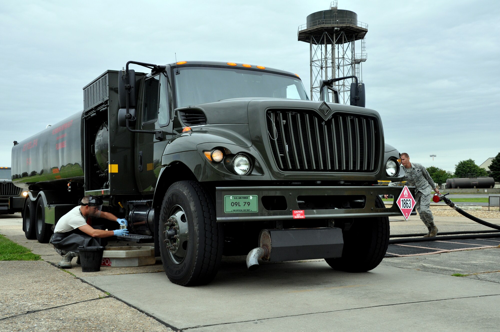 RAF MILDENHALL, England -- Senior Airman Nicholas S. Horsely and Airman 1st Class Kyle A. Clark, 442nd Logistics Readiness Squadron fuels technicians, complete daily inspections on a refueling truck here, June 30, 2012. Horsely and Clark, along with approximately 50 other reservists from the squadron, were deployed for training. The 442nd LRS is part of the 442nd Fighter Wing, an A-10 Thunderbolt II Air Force Reserve unit at Whiteman Air Force Base, Mo. (U.S. Air Force photo/Staff Sgt. Danielle Johnston)