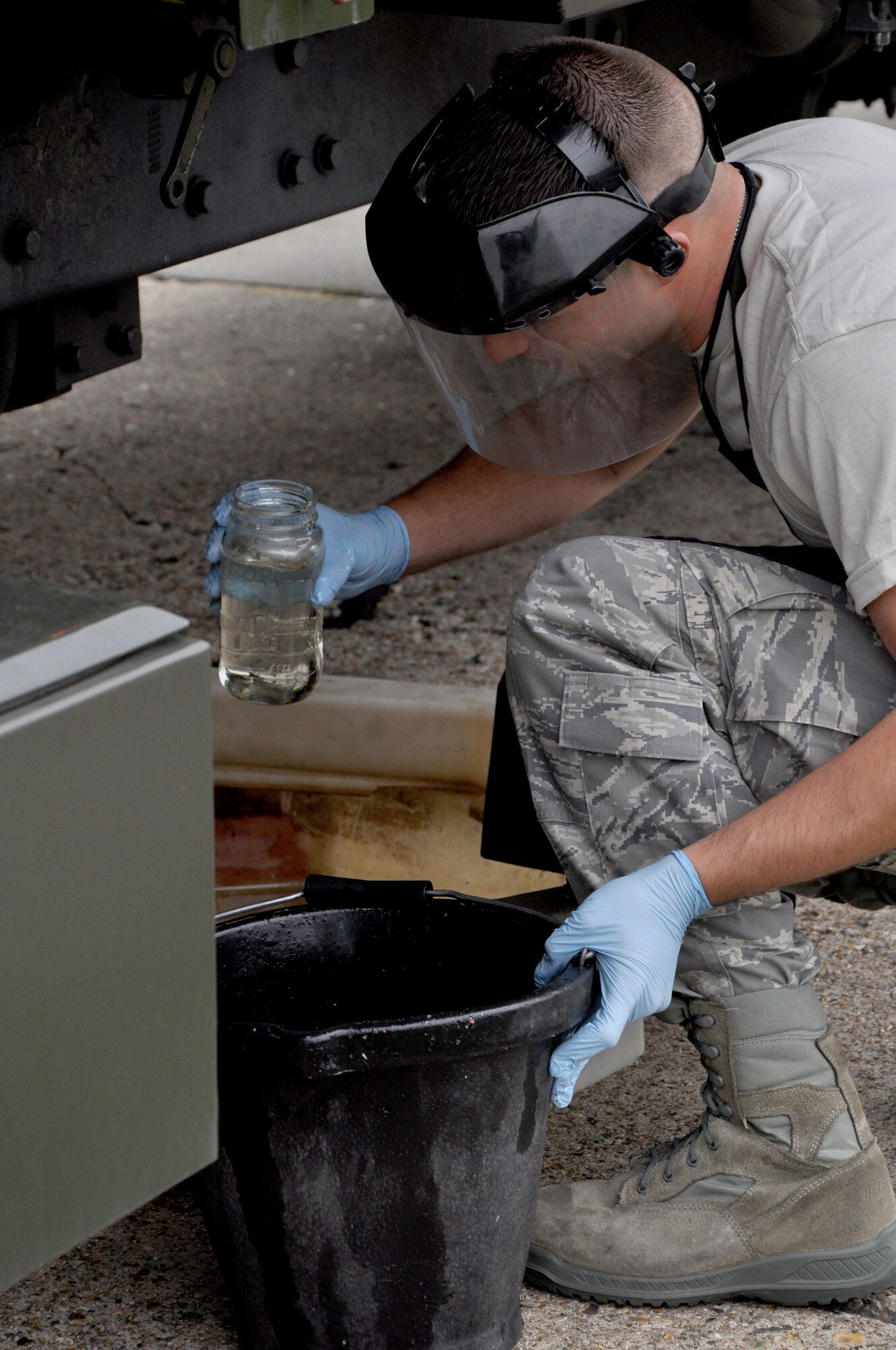 RAF MILDENHALL, England -- Senior Airman Nicholas S. Horsely, 442nd Logistics Readiness Squadron fuels technician, takes samples from an aircraft refueling truck here, June 30, 2012. Horsely, along with approximately 50 other reservists from the squadron, was deployed for training. The 442nd LRS is part of the 442nd Fighter Wing, an A-10 Thunderbolt II Air Force Reserve unit at Whiteman Air Force Base, Mo. (U.S. Air Force photo/Staff Sgt. Danielle Johnston)