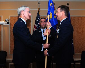 U.S. Air Force Col. Jeffrey Kruse receives the 480th Intelligence Surveillance and Reconnaissance Wing guidon from Maj. Gen. Robert Otto, Air Force ISR Agency commander, during a change of command ceremony, July 10, 2012, at Langley Air Force Base, Va. Kruse, who recently served as the wing commander of the 361st ISR wing at Hurlburt Field, Fla., succeeds Col. Paul Nelson, who will move on to become the AFISR agency vice commander. (U.S Air Force photo by Airman 1st Class Brian Kelly/Released)